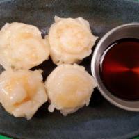 Shumai (4) · Steamed jumbo dumplings filled with shredded shrimp.