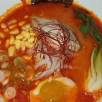 Spicy Miso Ramen · Home made rich pork and spicy miso soup with wavy noodle, chashu, green onions, corns, soft ...