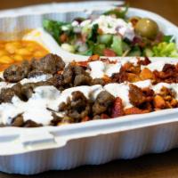 Combo · Half marinated chicken and gyro seasoned lamb served over your choice of rice, salad, or hal...