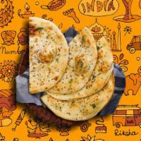 Cheese Naan · House made pulled and leavened dough filled with cheese and baked to perfection in an Indian...