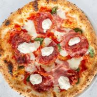 Carnivora Pizza · San marzano tomato, fior di latte, mild salami, ricotta, prosciutto cotto (ham) and basil. N...