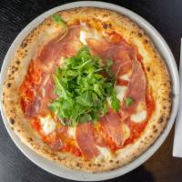 Caserta Pizza · San marzano tomato, fior di latte, 20 month prosciutto di Parma and arugula. Nut free.