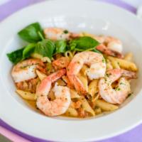 Garlic Butter Shrimp · Tossed with Penne Pasta, Tomatoes, Parmesan Cheese, and Arugula.