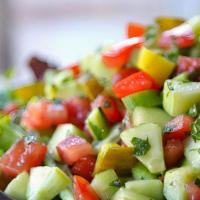 Arabian Salad · Tomatoes, cucumbers, parsley, olive oi, mint, onions ,lemon