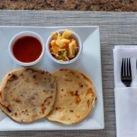 Pupusas Cheese · Corn tortilla stuffed with cheese, beans or mixed pork and cheese (revueltas).