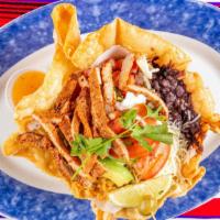Ortega'S Taco Salad · Flour tortilla shell filled with mixed greens, black beans, rice, pico de gallo, avocado, so...