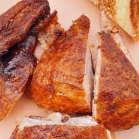 Bbq Chicken · slow smoked and dry rubbed. served with texas toast and pickles.