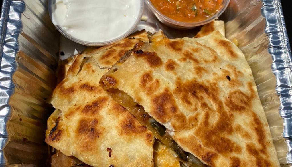 Bbq Quesadillas* · choice of bbq meat, cheddar and jack cheeses, grilled poblano peppers and onions. served with smoked tomato salsa and sour cream.