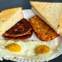 Breakfast Platter · 2 eggs, choice of meat with toast and hash brown patty.
