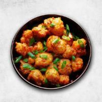 Cauliflower Ott Manchurian · Cauliflower coated in batter and deep-fried in oil, tossed up in different sauces.