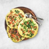 Vegetable Lentil Pancake · Thick, spongy pancake, with finely chopped chilies & fresh vegetables cooked right into the ...