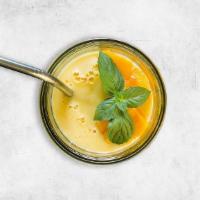 Churned Mango Yogurt Smoothie · A thick smoothie made with fresh churned mango flavored yogurt beverage