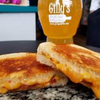 Ghost Pepper Grilled Cheese · Extra hot. Bacon, Cheddar, Ghost Pepper Jack Cheese on sliced Sourdough Bread.