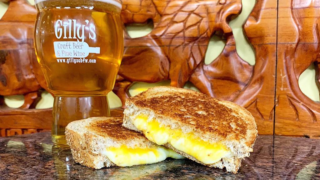 Grilled Cheese · Vegetarian. Cheddar, Swiss, Provolone Cheese melted to perfection on sliced Whole Wheat Bread.