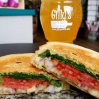 Tere'S Toasted Tomato And Brie · Melted Brie, Tomato, Onion, Arugula and Tarragon Mustard on sliced Sourdough Bread.