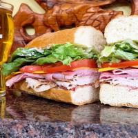 Club Crete - Large Size · Turkey, Ham, Bacon, Cheddar, Lettuce, Tomato and Mayo on White Sub Roll.