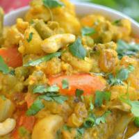Navratan Korma · A mix of 9 garden vegetables and nuts cooked in a rich cashew nut sauce. Served with steamed...