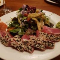 Seared Ahi Tuna Salad · Seared sesame-crusted ahi tuna accompanied with baby field greens, mango, avocado, red peppe...