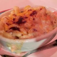 Bacon, Mac & Cheese · Diced onion, applewood bacon, and cayenne pepper, tossed with sharp white cheddar cheese, cr...