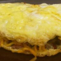 Meat Lover Omelette · Three eggs, sausage, bacon, ham, cheese.