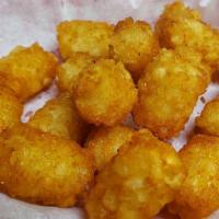 Lunch Tater Tots · 20 taters fried golden and crispy.