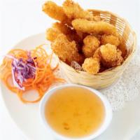 Crispy Calamari · Lightly battered calamari served with pineapple sauce.