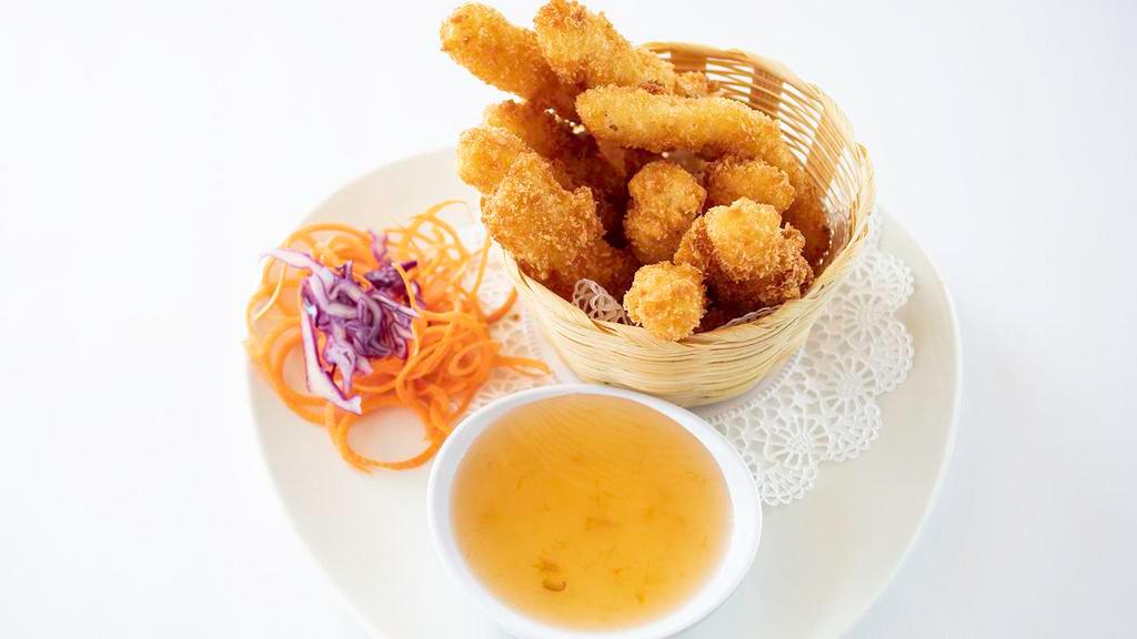 Crispy Calamari · Lightly battered calamari served with pineapple sauce.