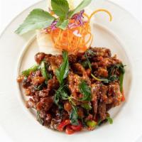 Crispy Duck Basil · Crispy duck tossed in our delicious chef's basil sauce. Topped with crispy basil leaves.