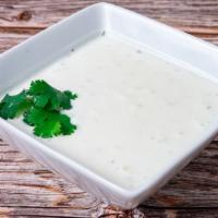 Mast O Khiar · Additional tray of cucumber & herb yogurt for your catering order.