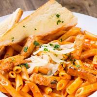Penne And Grilled Chicken A La Vodka · Penne pasta simmered in a creamy vodka sauce topped with our tender grilled chicken breast, ...