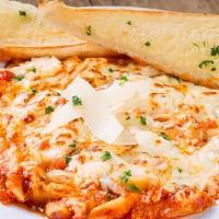 Three Cheese Baked Penne · A hearty pasta dish smothered in marinara sauce then baked with ricotta, mozzarella, and asi...