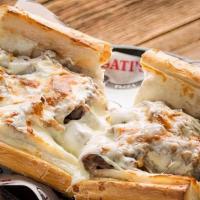 The Chef Sandwich · Our delicious Italian beef on Italian bread with melted mozzarella cheese on top. Served wit...