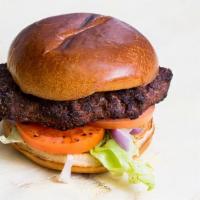 Burger · Half pound. Ground beef patty with lettuce, tomato, onion, juiciness, and flavor.
