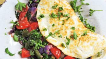 Egg White And Young Kale Omelet · Gluten-free. Sautéed onions, low-fat cheddar cheese, mini tomato, and field greens salad.