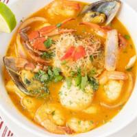 Parihuela · Hearty and spicy Peruvian seafood soup with fish, shrimp, squid, mussels and octopus. Served...