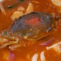 Sudado De Pescado · Stewed fish sauteed with tomatoes, onion, cilantro served with rice.