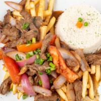 Lomo Saltado · Sauteed beef or chicken with onions, tomatoes, French fries and rice.