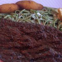 Tallarin A La Huancaina Con Bistec · Linguini with Peruvian yellow pepper, cheese sauce, served with steak.