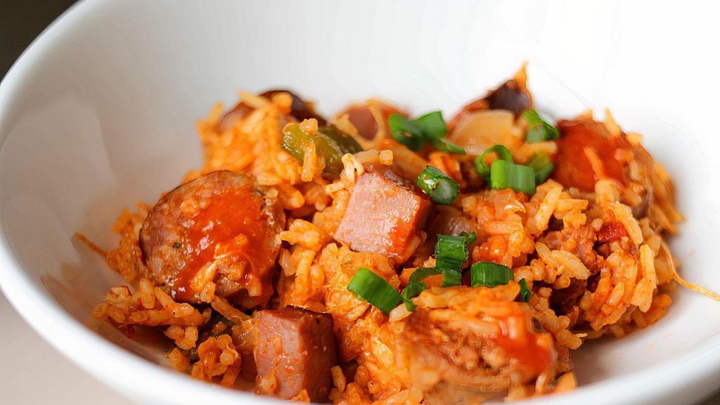 Chicken & Sausage Creole Jambalaya (Gf) · A traditional red creole jambalaya, consisting of onion, peppers, bacon, ham, summer sausage, andouille sausage and rice. It's all cooked together until the flavours are combined and deep. Delicious!!