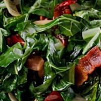 Braised Collard Greens With Bacon(Gf) · Fresh collard greens torn by hand so we use only the tender parts of the leave. Never choppe...