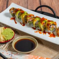 Dragon Roll · Raw. In: crabmeat and cucumber. Out: toasted eel, avocado, capelin fish roe, and eel sauce.