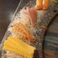 Traditional Sashimi Plate (For 2) (18 Pieces) · Chef's selection.
