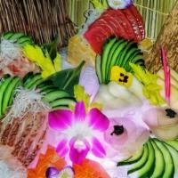 Sashimi Deluxe S · Raw. 18 pieces assorted fillets of fresh raw fish and rice.