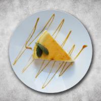 Cheese Cake · Classic cheesecake with a rich, dense, smooth, and creamy consistency.