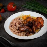 Fricasse Chicken (Brown Stew)  Dinner · Full of Caribbean flavor, a whole chicken is first fried then simmered in our savory-sweet b...
