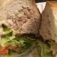 Tuna (Deli) Large Sub · Served with Lettuce, Tomatoes, Mayo and American Cheese.