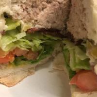Tuna (Deli) Small Sub · Served with Lettuce, Tomatoes, Mayo and American Cheese.