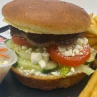 Mediterranean Burger · Feta cheese, Tzatziki sauce, Tomato, cucumbers,  and Lettuce