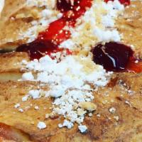 Nutella Strawberry Calzone · With Powder sugar, Mixed Nuts.