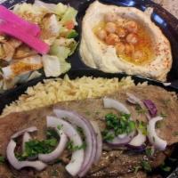 Gyro Plate · Greek gyro served with rice, salad, hummus, and pita bread. Small side of tzatziki included.